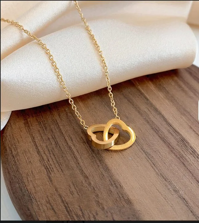 MEQAD double heart necklace